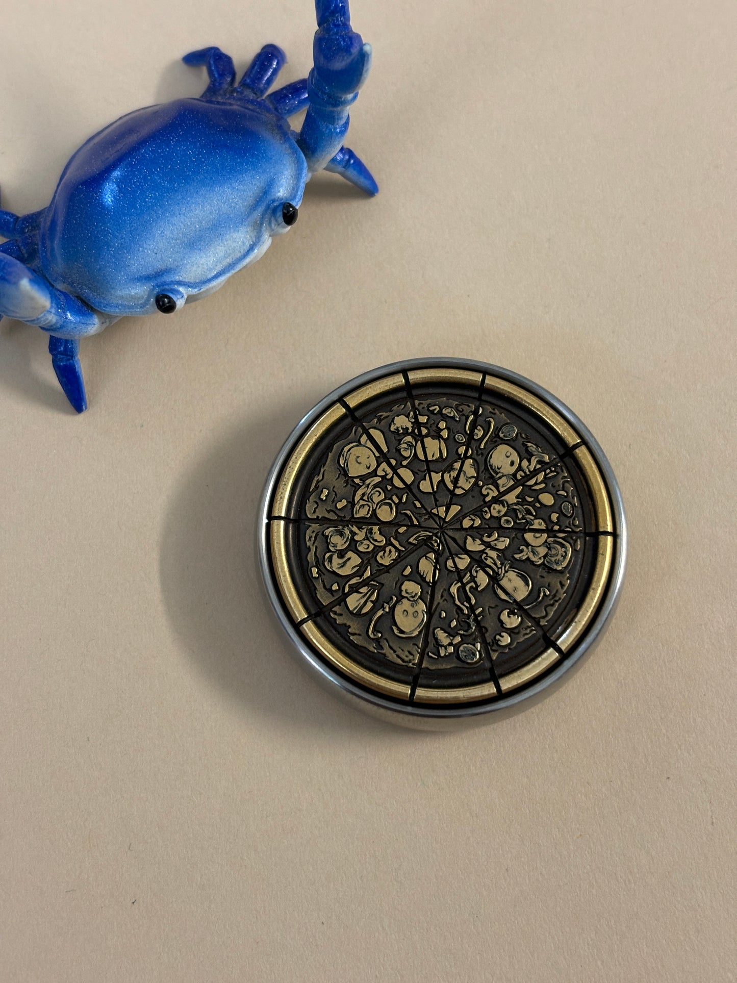 Umburry armored haptic coin - mid size ti/brass- haptic coin - fidget toy